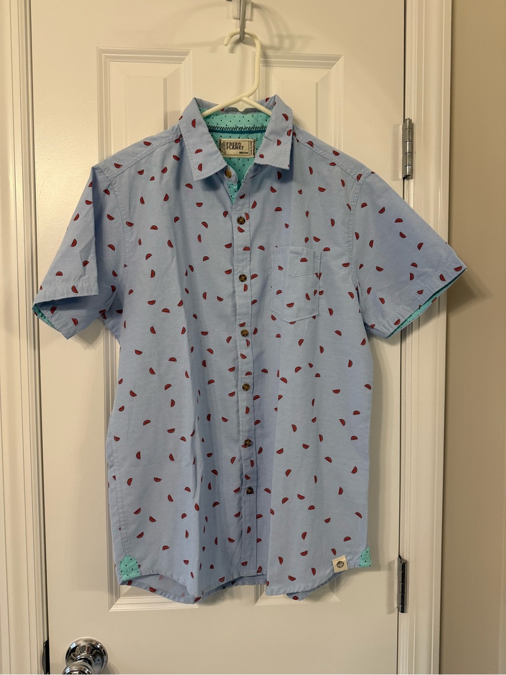 Free Planet Light Blue Short Sleeve Button-Down Shirt with Red Seed Print